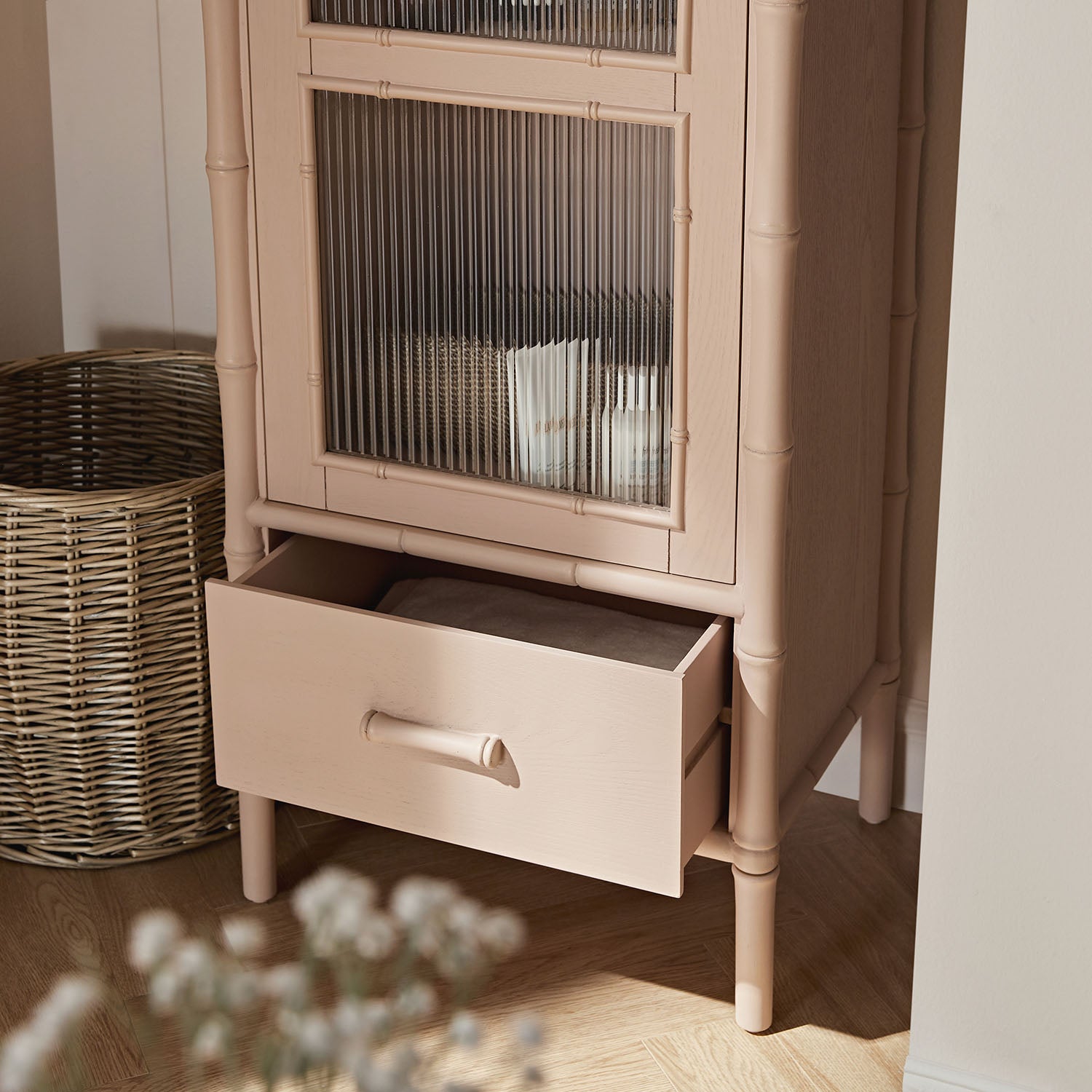 Elstowe Faux Bamboo and Fluted Glass 1-Door Cabinet, Nude Pink